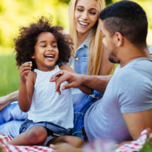 Couple and child at park
