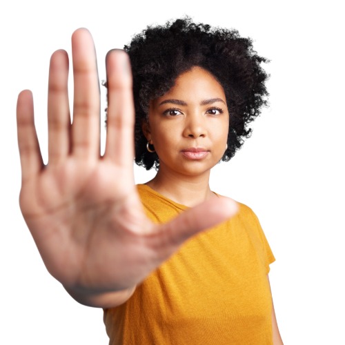 person holding up hand to stop