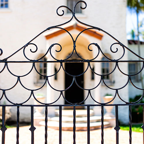 decorative fence in front of a home