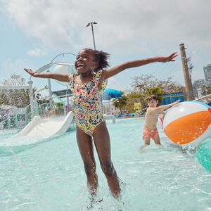 girl swimming at flamingo pool