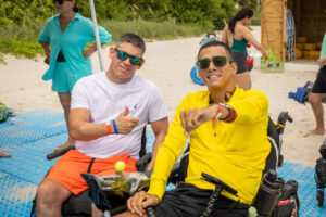 people at the beach using wheelchairs