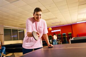 boy playing table tennis