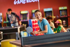girl playing table tennis