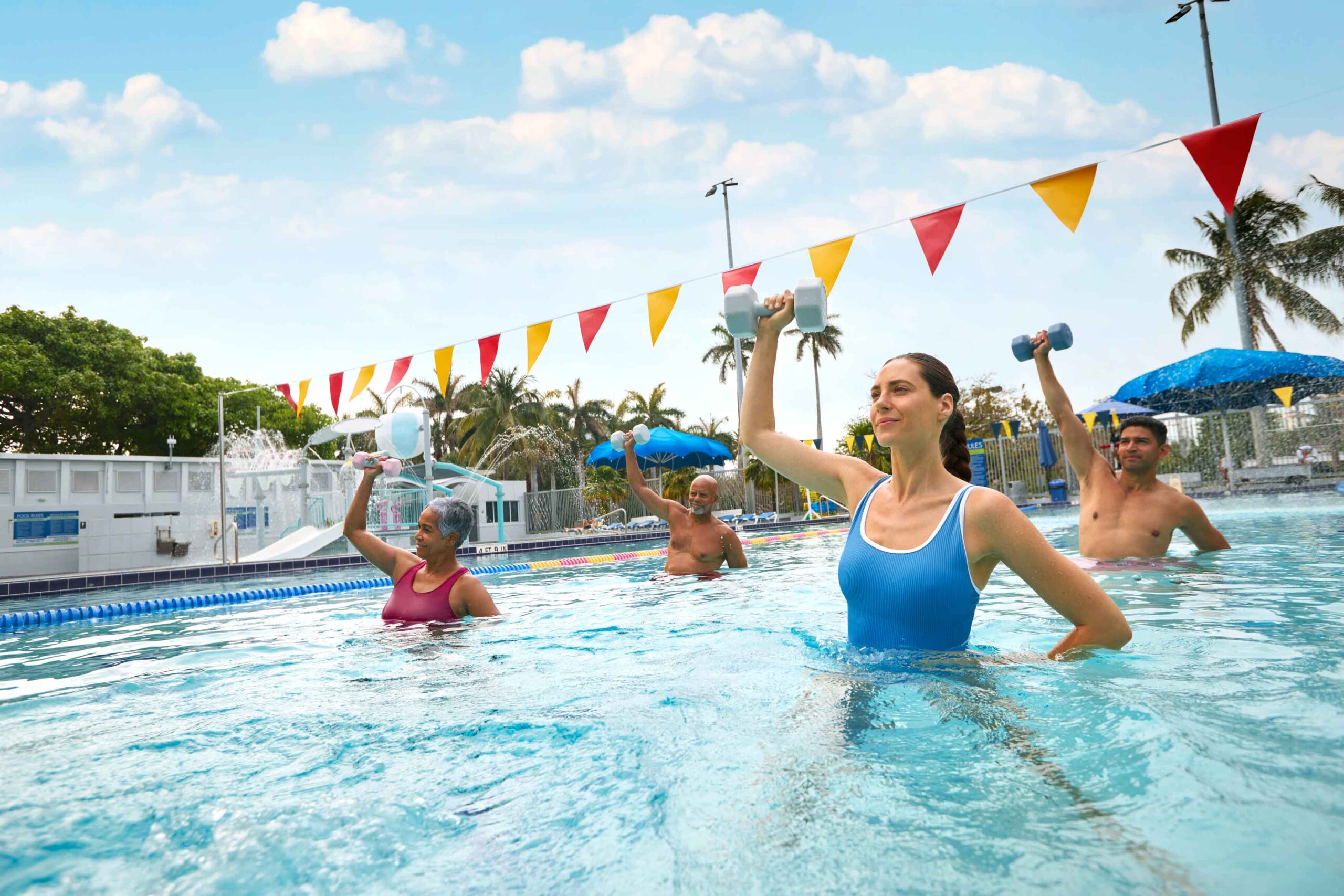 people doing group fitness in pool