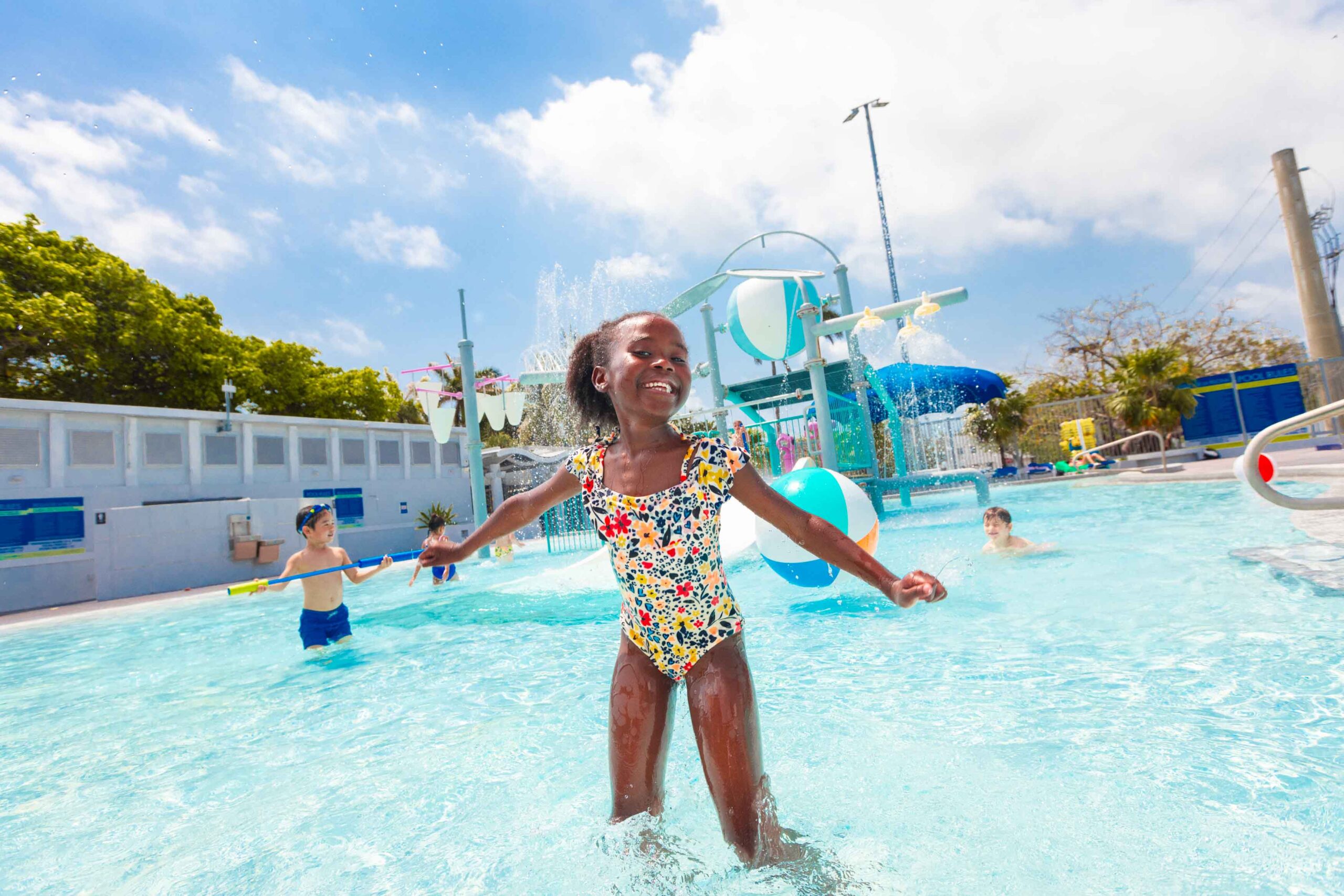 girl standing in pool