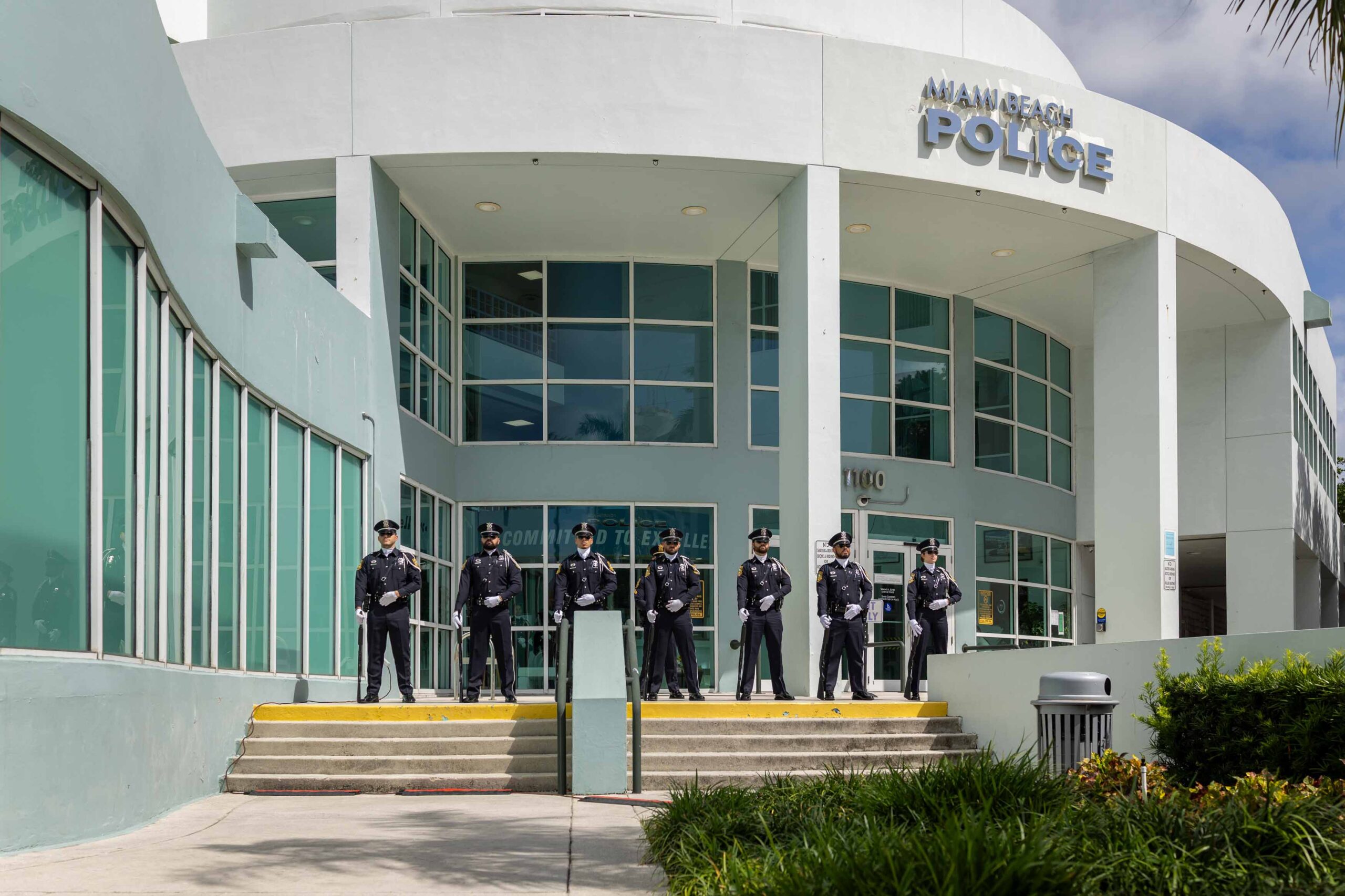 officers in front of station