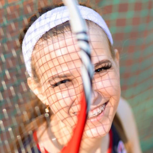 Girl holding racquetball racquet
