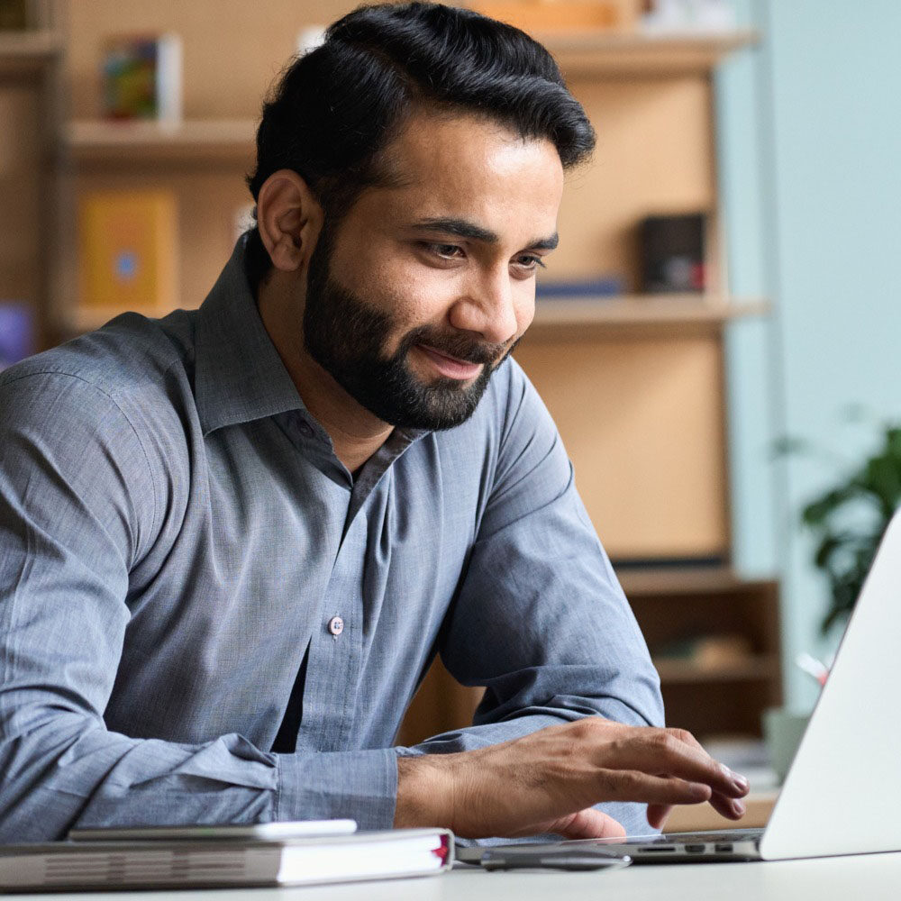 Man looking at a computer