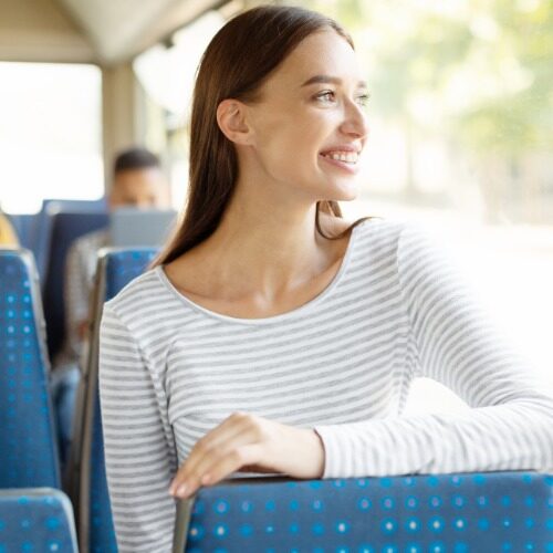 Woman riding in a bus